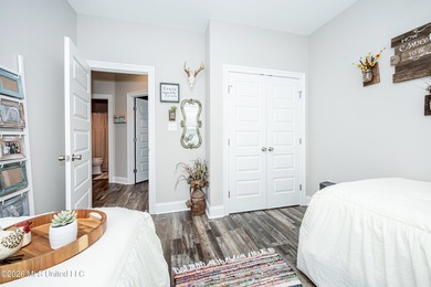 Tucked away in a charming coastal town, this 4-bedroom, 2-bath - photo 27