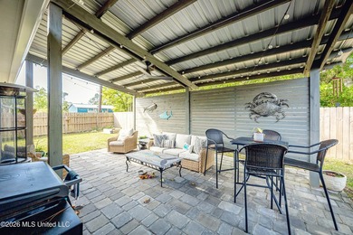 Tucked away in a charming coastal town, this 4-bedroom, 2-bath - photo 31