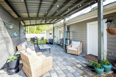 Tucked away in a charming coastal town, this 4-bedroom, 2-bath - photo 34