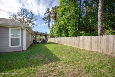 Tucked away in a charming coastal town, this 4-bedroom, 2-bath - photo 36