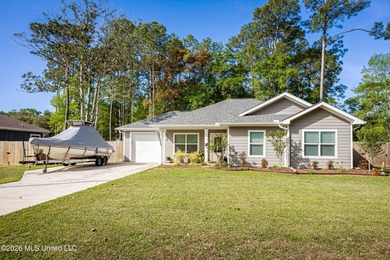 Tucked away in a charming coastal town, this 4-bedroom, 2-bath - photo 41