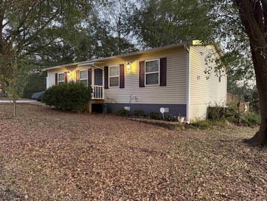 Discover comfort, convenience, and peaceful country living in