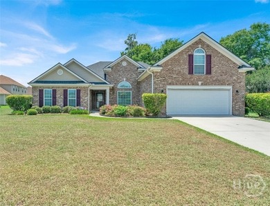 Welcome to this spacious, one-owner home in the desirable - photo 1