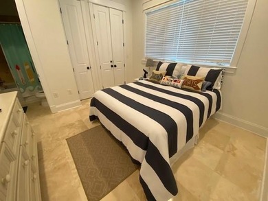Located in the luxurious Beach Club resort, this 3-bedroom home - photo 8