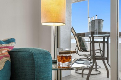 You don't buy a condo at the beach just to hold your stuff. You - photo 3