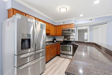 Welcome to Golf Glenn Villas! This inviting 2 bedroom, 2 bath - photo 17