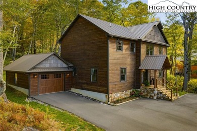 Nestled under the peaks of Sugar Mountain is this 3 bedroom, 3.5 - photo 1