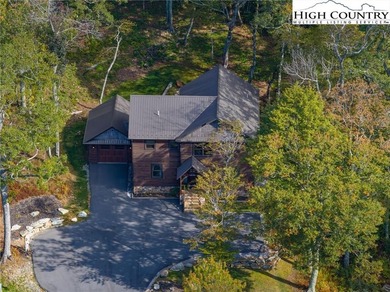 Nestled under the peaks of Sugar Mountain is this 3 bedroom, 3.5 - photo 2