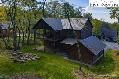 Nestled under the peaks of Sugar Mountain is this 3 bedroom, 3.5 - photo 4