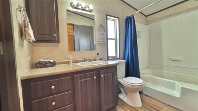 Your fishing retreat awaits at Lake Fork! This charming