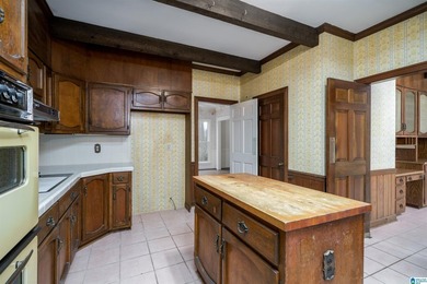 This full brick estate in Mountain Brook sitting on 2 acres can