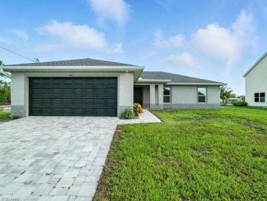 Lake Home For Sale in Lehigh Acres, Florida