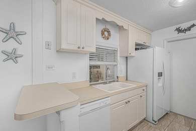 SHORT SALE BACK ON THE MARKET! Nestled in a quiet and desirable - photo 12