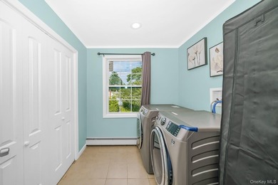 Welcome to this beautiful expanded cape located in Islip. This - photo 21