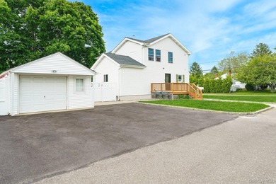 Welcome to this beautiful expanded cape located in Islip. This - photo 26