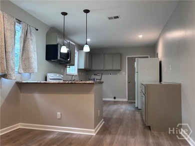 This charming bungalow is located in an area of active - photo 4