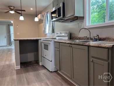 This charming bungalow is located in an area of active - photo 7
