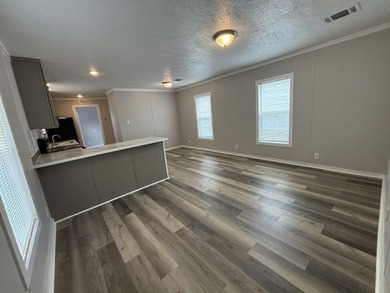 Make your new home in Paradise Village, a well-maintained - photo 3