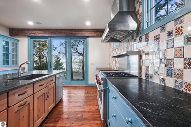 Discover the pinnacle of Northern Michigan living in this - photo 19