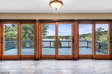 Custom lakefront chalet offering deep-water frontage, an - photo 11