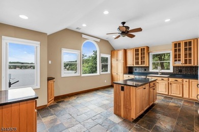 Custom lakefront chalet offering deep-water frontage, an - photo 12