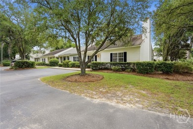 Tucked away on Wilmington Island, this two-bedroom, two-bathroom - photo 3