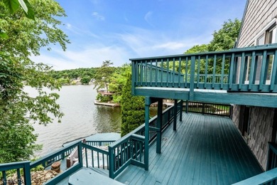 Custom lakefront chalet offering deep-water frontage, an - photo 39