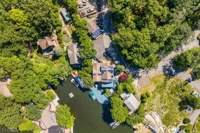 Custom lakefront chalet offering deep-water frontage, an - photo 43
