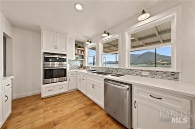 Experience breathtaking south-facing views of Clear Lake and Mt - photo 10