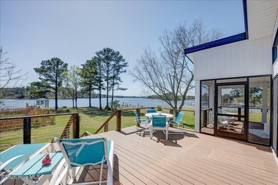 This secluded, contemporary waterfront home sits on a quiet - photo 27