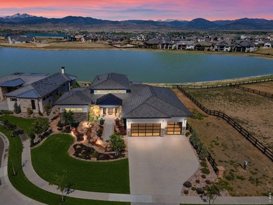 Backing breathtaking water and mountain views, this stunning - photo 1