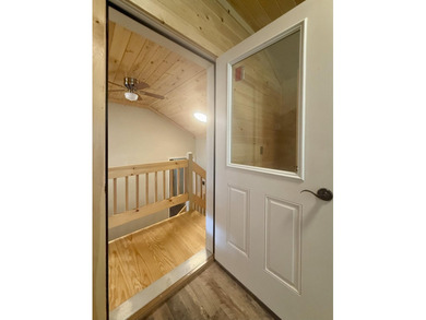 Set on 2 private acres along the shores of beautiful Long Lake - photo 31