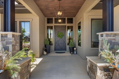 Backing breathtaking water and mountain views, this stunning - photo 3