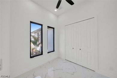 Step into modern Florida luxury in this brand-new 2026-built - photo 22