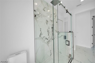 Step into modern Florida luxury in this brand-new 2026-built - photo 33