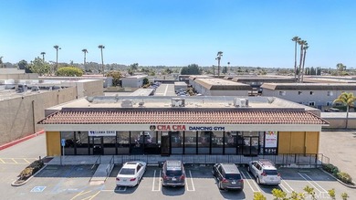 Located in a highly visible commercial district in Huntington - photo 1