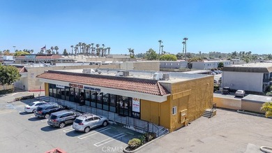 Located in a highly visible commercial district in Huntington - photo 2