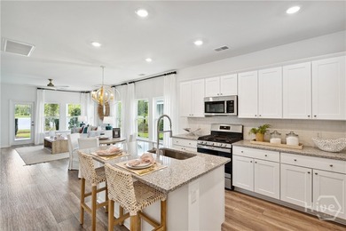 This cozy single-story Palmetto home design features an open - photo 3