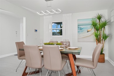Welcome to seaside living just steps from the beach! This - photo 8