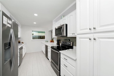 Welcome to seaside living just steps from the beach! This - photo 9