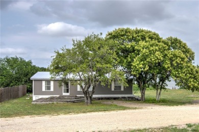 Lake Home For Sale in Sandia, Texas