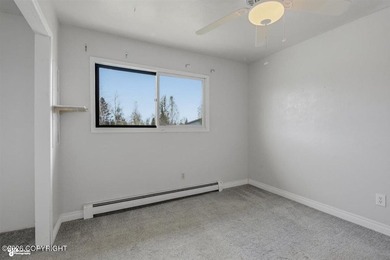 This charming home features a spacious layout with a large - photo 13
