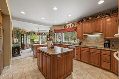 Nestled within the prestigious Highlands Golf Course community - photo 14