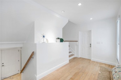 This gorgeous home offers an inviting entryway with an elevator