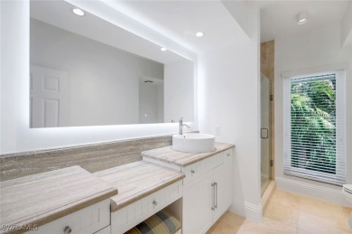 This gorgeous home offers an inviting entryway with an elevator