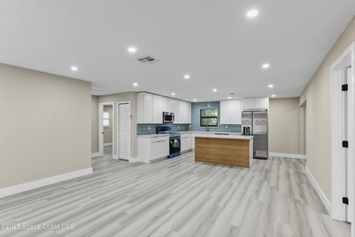 Welcome to this beautifully remodeled 4-bed, 2-bath home that - photo 4