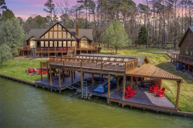 Incredible waterfront home on Lake Cypress Springs. Cedar home - Lake Home Sale Pending in Scroggins, Texas