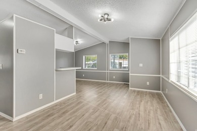 Beautifully fully remodeled double-wide mobile home in a highly - photo 3