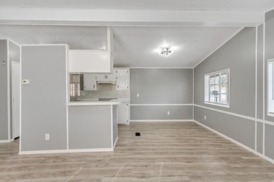 Beautifully fully remodeled double-wide mobile home in a highly - photo 5