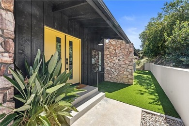 Welcome to this beautifully upgraded mid-century modern home in - photo 2